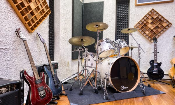 Live Room Drum Corner Tight β True Music Studios Tight straight-on shot of drum kit in live room with mic stands.